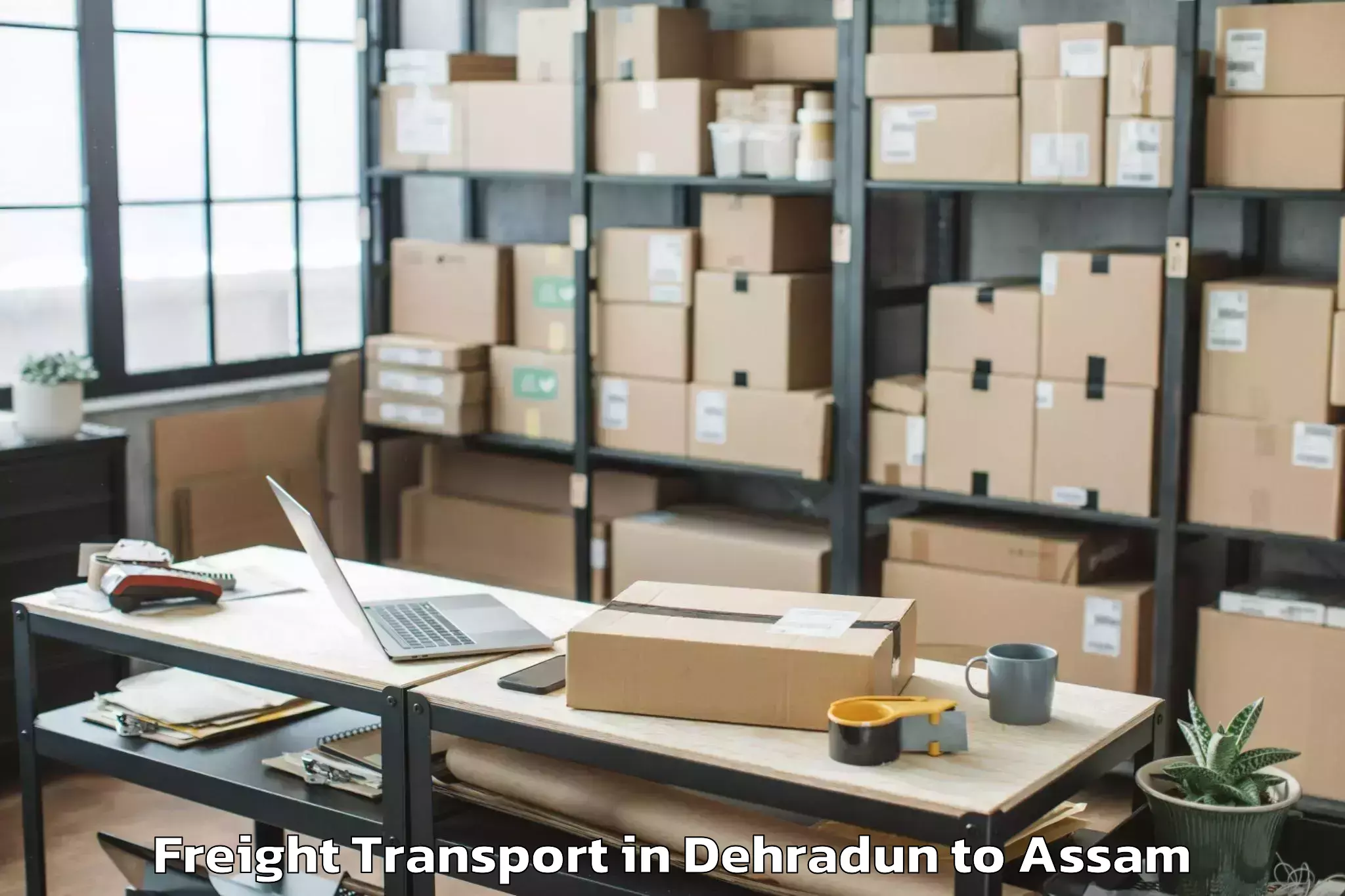 Trusted Dehradun to Dergaon Freight Transport